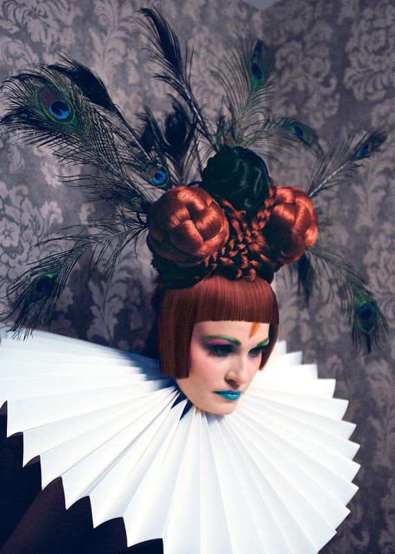Robert Kirby s avant garde women collection Yana Kozyr wears ginger hair master piece are with peacock feathers