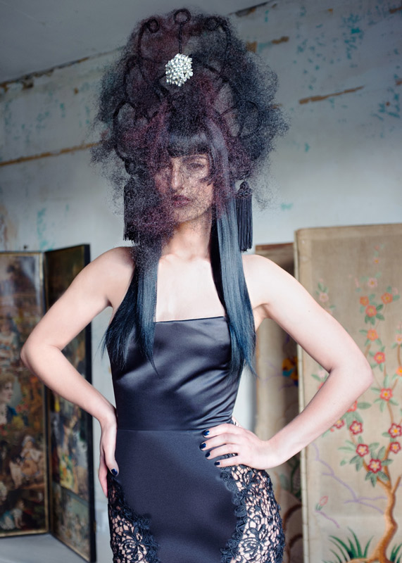 Robert Kirby s avant garde women collection art piece hair with jewellery black dress